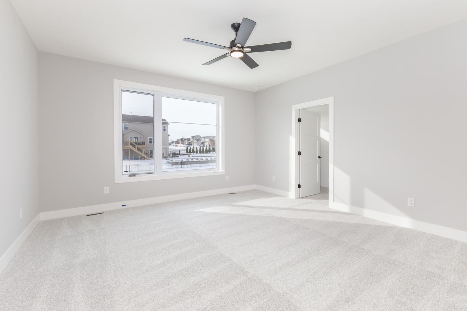 5303 Finlen Lane Bloomington, IL 61705 - Photo 30 of 58 a view of an empty room with a window