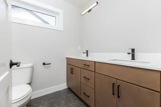 a view of a room with wooden walls