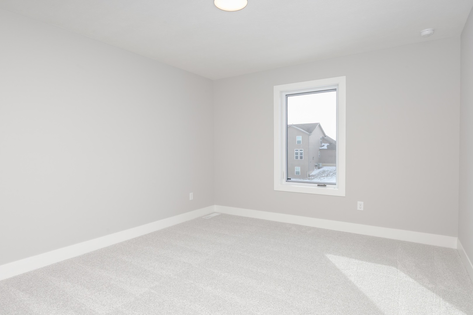 5303 Finlen Lane Bloomington, IL 61705 - Photo 42 of 58 an empty room with a window