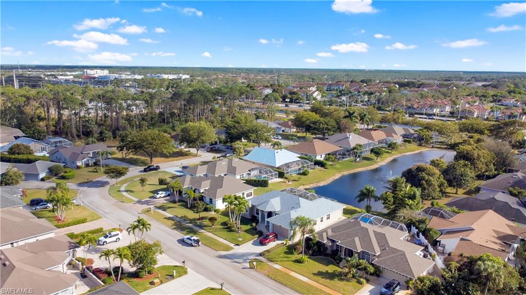 11141 Palmetto Ridge Drive Naples, FL 34110 - Photo 27 of 31 an aerial view of a city