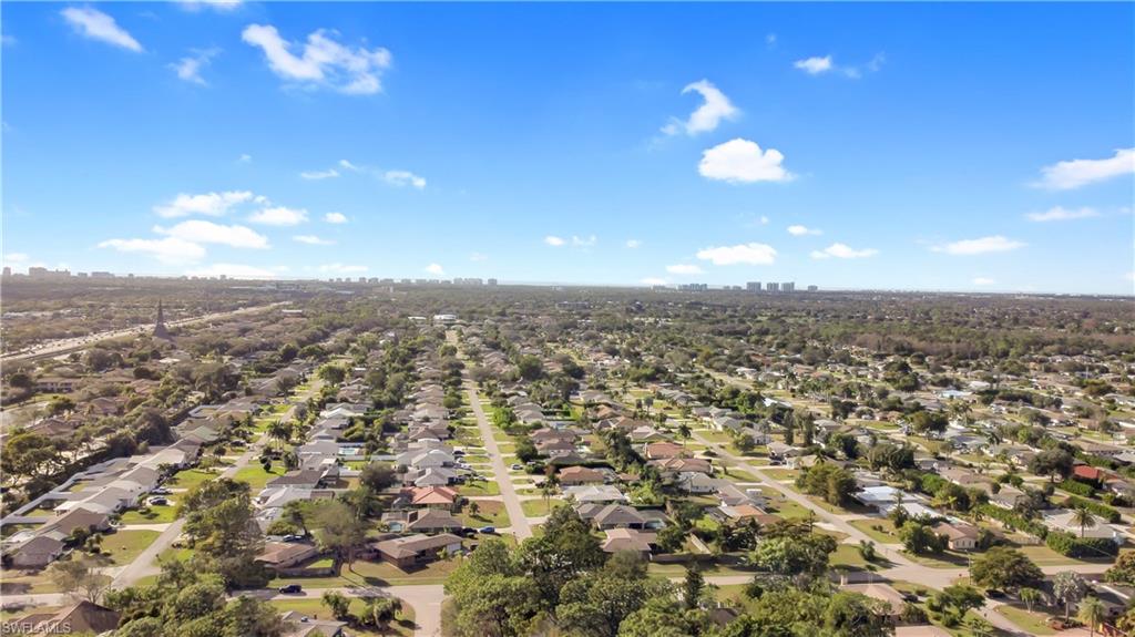 11141 Palmetto Ridge Drive Naples, FL 34110 - Photo 30 of 31 an aerial view of residential houses with city view