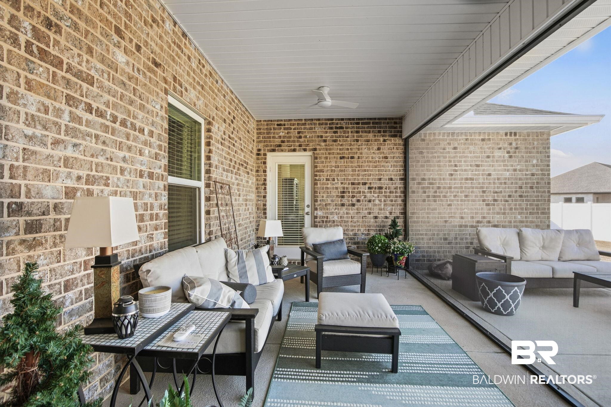 11123 Genuine Risk Circle Daphne, AL 36526 - Photo 55 of 67 View of patio with outdoor lounge area and ceiling fan