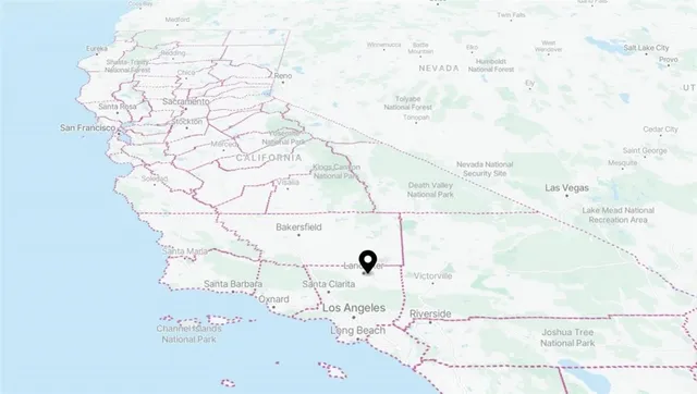 a picture of a bathroom with a shower and a sink