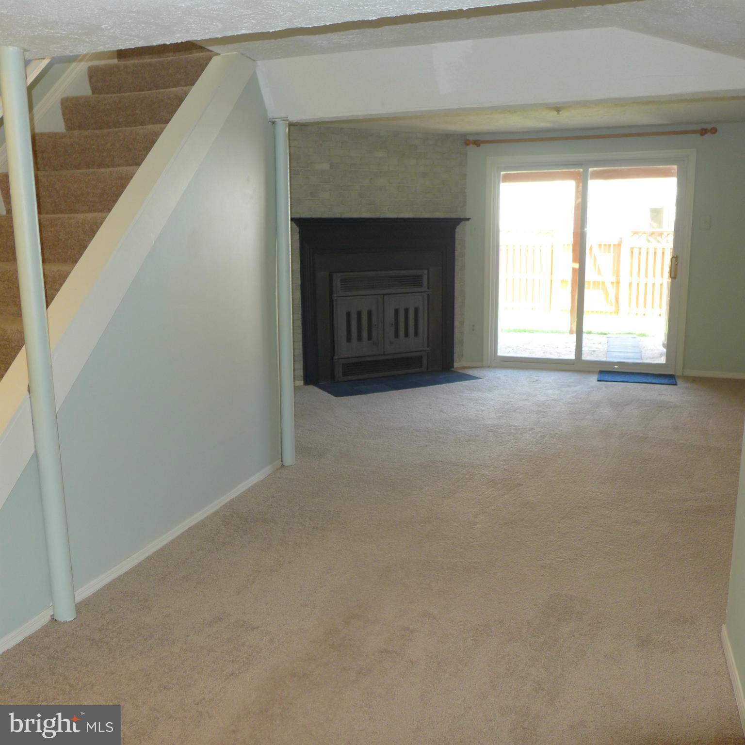 14 Trailwood Road Baltimore, MD 21236 - Photo 16 of 24 Basement Rec Room w/Fireplace & Walk out