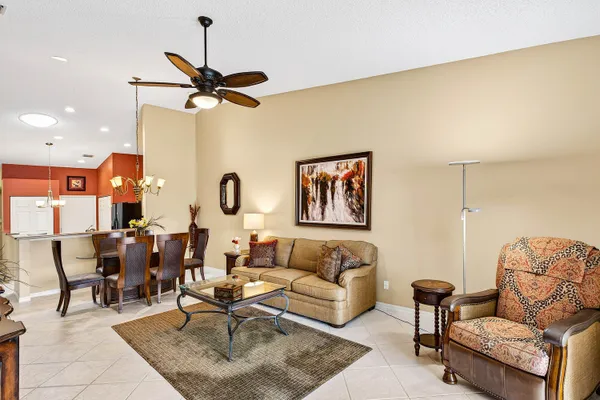 a living room with furniture and flat screen tv