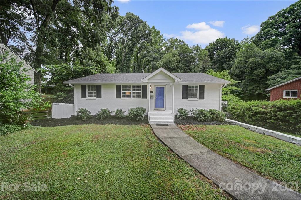 5046 Milford Road Charlotte, NC 28210 - Photo 1 of 32 a front view of a house with a yard