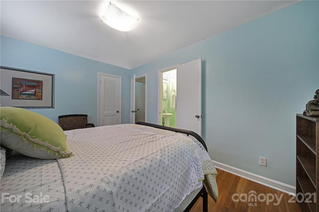 5046 Milford Road Charlotte, NC 28210 - Photo 11 of 32 a bedroom with a bed and a window