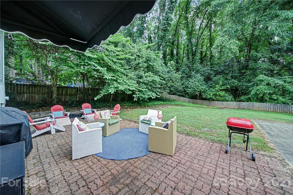 5046 Milford Road Charlotte, NC 28210 - Photo 27 of 32 a view of a backyard with sitting area
