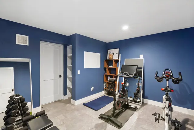 a view of a room with gym equipment