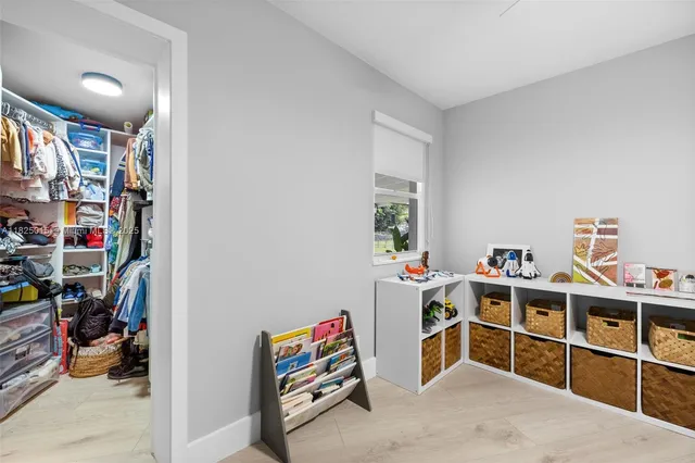 a view of a room with baby toys