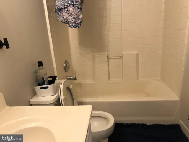 a bathroom with a sink and bathtub