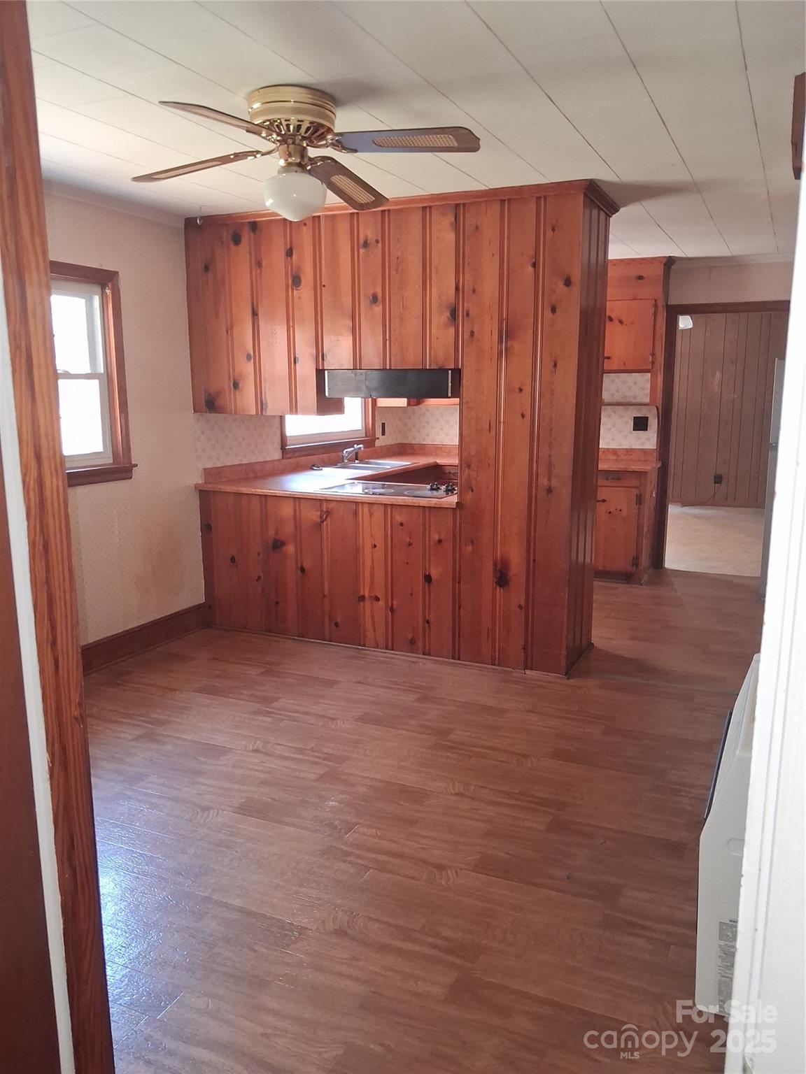2833 Camp Creek Church Road Mooresboro, NC 28114 - Photo 22 of 43 a kitchen with granite countertop a refrigerator and a sink