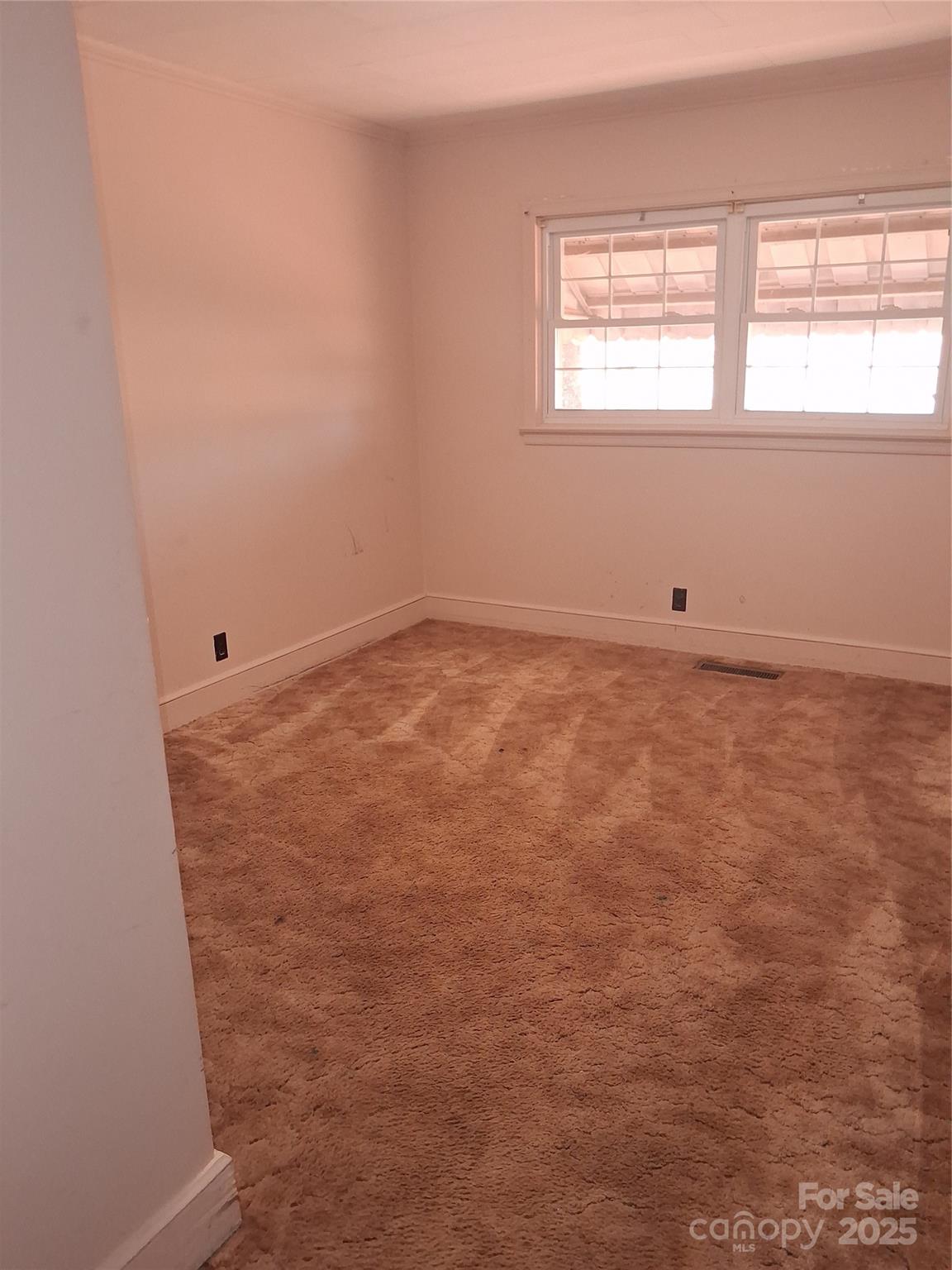 2833 Camp Creek Church Road Mooresboro, NC 28114 - Photo 32 of 43 an empty room with a window