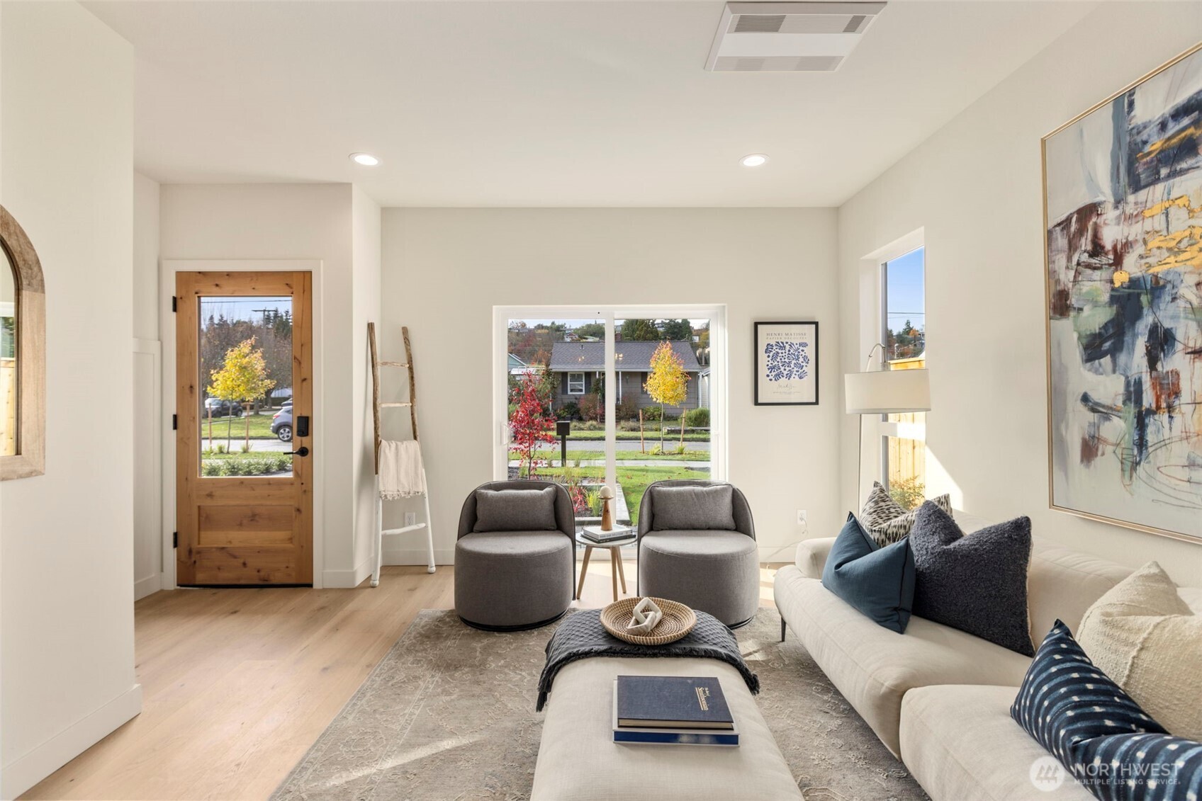 3404 33rd Avenue West Seattle, WA 98199 - Photo 12 of 29 a living room with furniture and a window