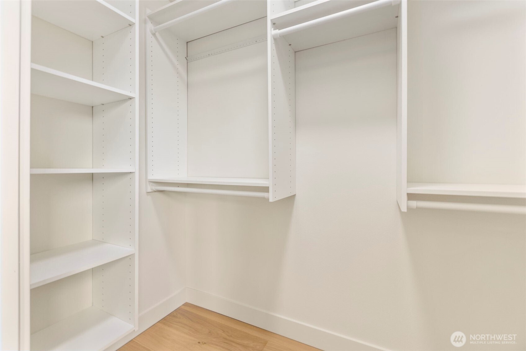 3404 33rd Avenue West Seattle, WA 98199 - Photo 20 of 29 a view of walk in closet with empty racks