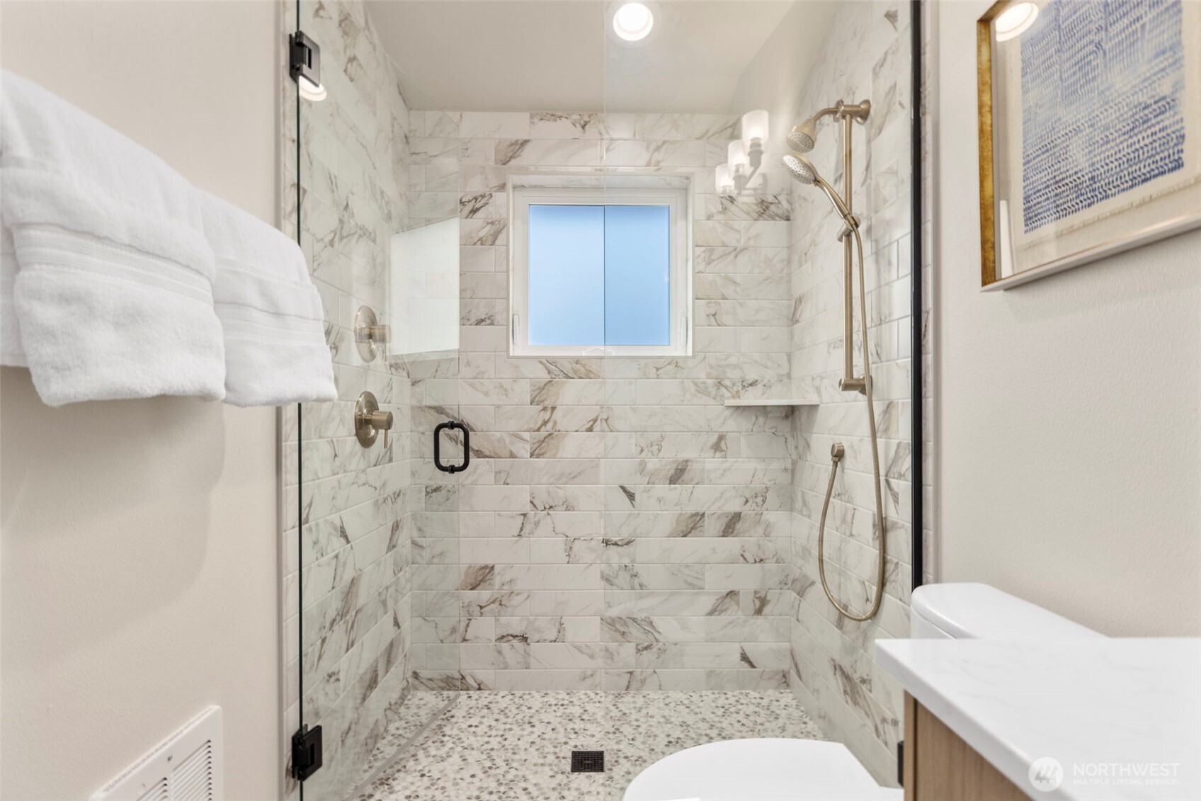 3404 33rd Avenue West Seattle, WA 98199 - Photo 23 of 29 a bathroom with a sink toilet and shower