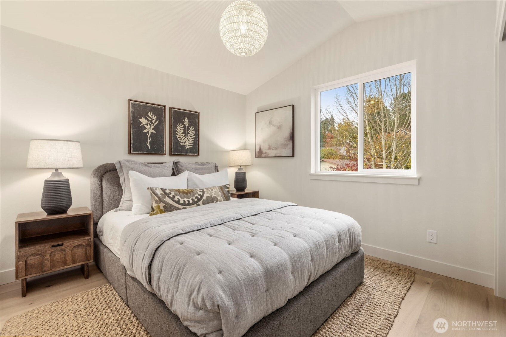 3404 33rd Avenue West Seattle, WA 98199 - Photo 24 of 29 a bedroom with a bed and a window