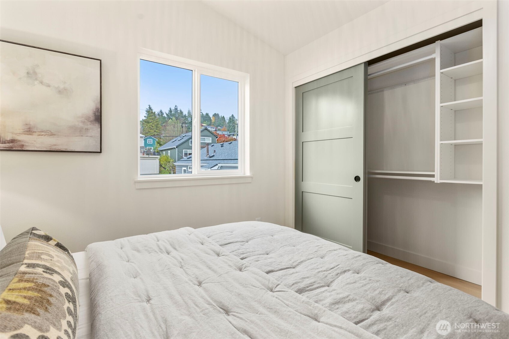 3404 33rd Avenue West Seattle, WA 98199 - Photo 25 of 29 a bedroom with a bed and a window