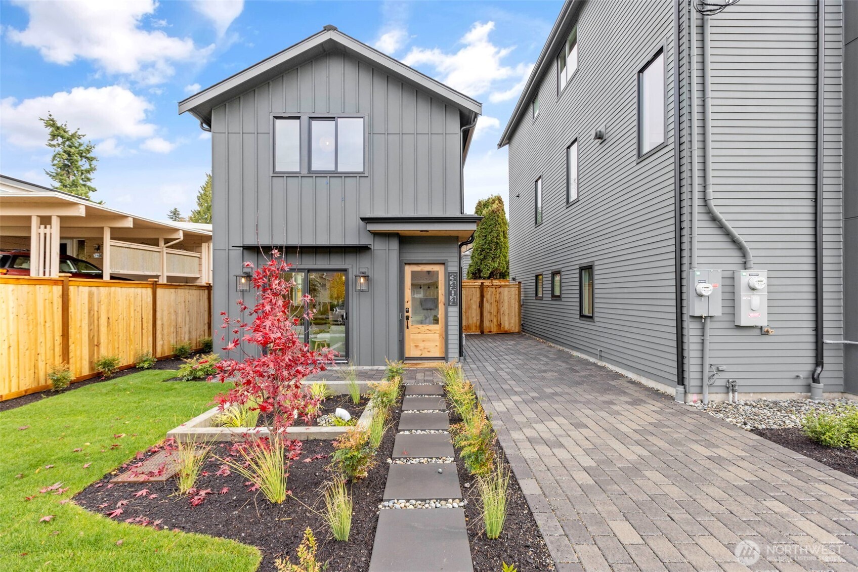 3404 33rd Avenue West Seattle, WA 98199 - Photo 27 of 29 a front view of a house with a yard