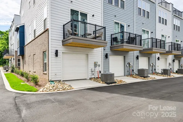 a view of a bedroom with washer and dryer