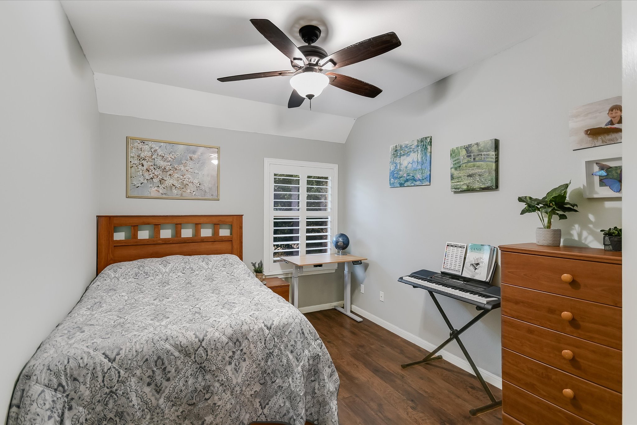 300 Wesley Ridge Drive Spicewood, TX 78669 - Photo 24 of 40 Three secondary bedrooms on the main level provide flexibility and convenience, offering space for family, guests, or a home office. The layout ensures privacy while keeping everyone close to the heart of the home.
