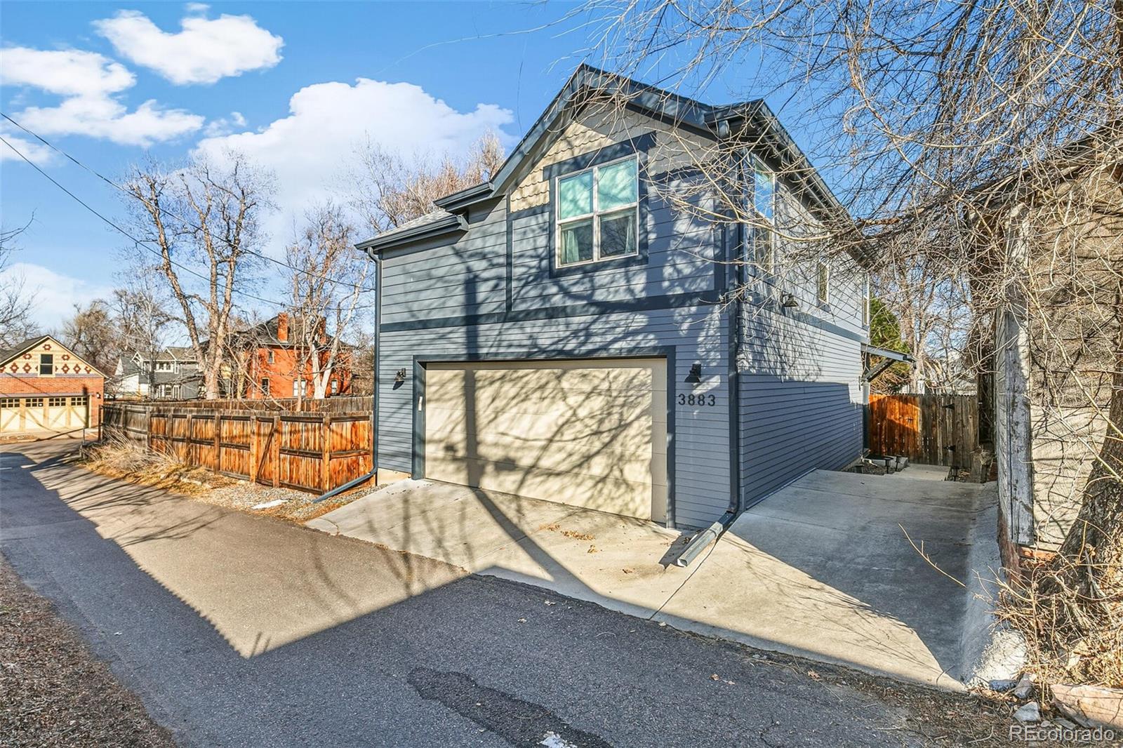 3885 Wolff Street Denver, CO 80212 - Photo 43 of 50 a view of a house with a snow