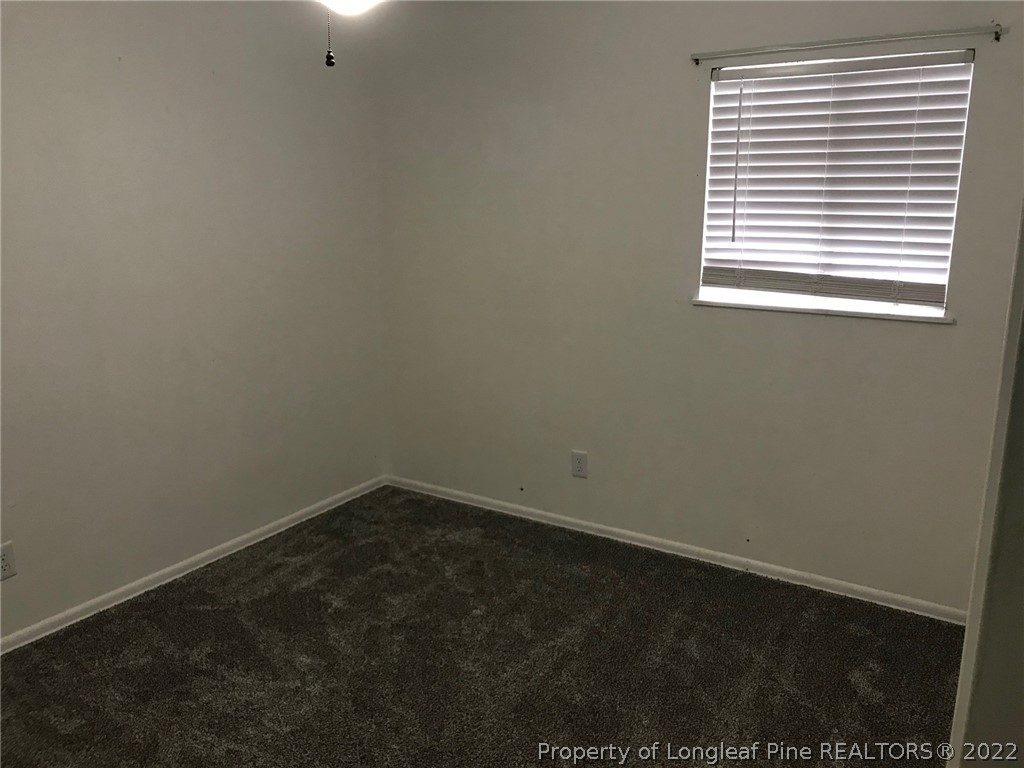 1602 Crescent Drive Spring Lake, NC 28390 - Photo 9 of 12 an empty room with a window