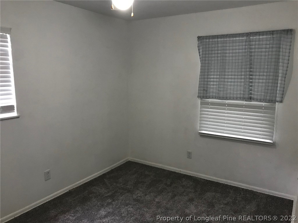 1602 Crescent Drive Spring Lake, NC 28390 - Photo 10 of 12 an empty room with a window