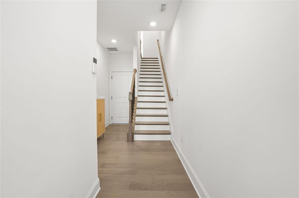 3927 Allegretto Circle Atlanta, GA 30339 - Photo 2 of 54 a view of a hallway with stairs