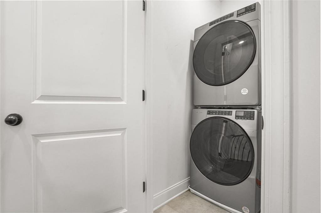 3927 Allegretto Circle Atlanta, GA 30339 - Photo 33 of 54 a close up view of a washer and dryer