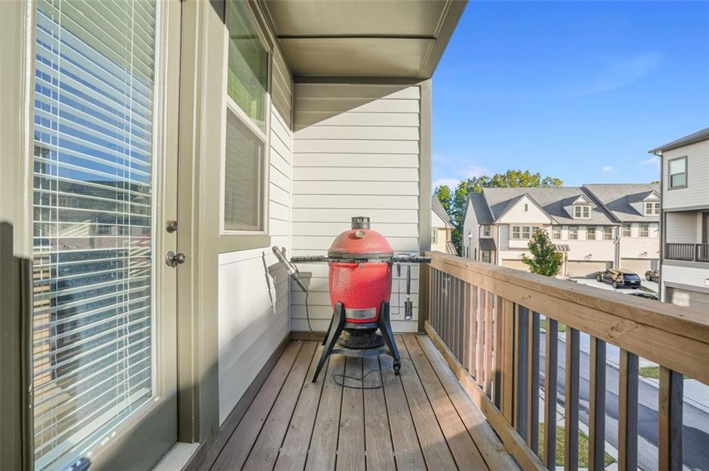 3927 Allegretto Circle Atlanta, GA 30339 - Photo 34 of 54 a view of a balcony with wooden floor