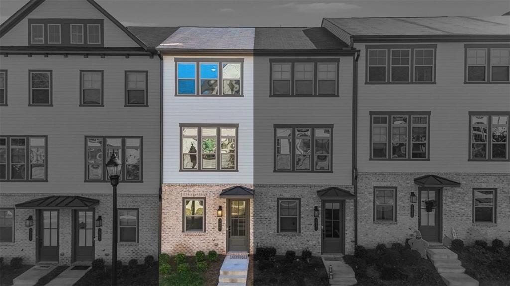 3927 Allegretto Circle Atlanta, GA 30339 - Photo 35 of 54 a front view of a building with glass windows