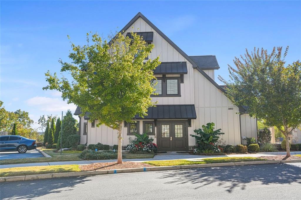 3927 Allegretto Circle Atlanta, GA 30339 - Photo 50 of 54 a view of a house with a swimming pool and a yard