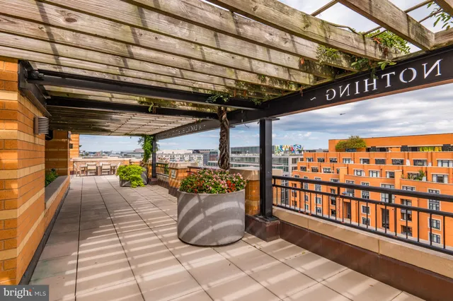 a view of a porch with wooden floor