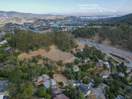 an aerial view of residential house and outdoor space