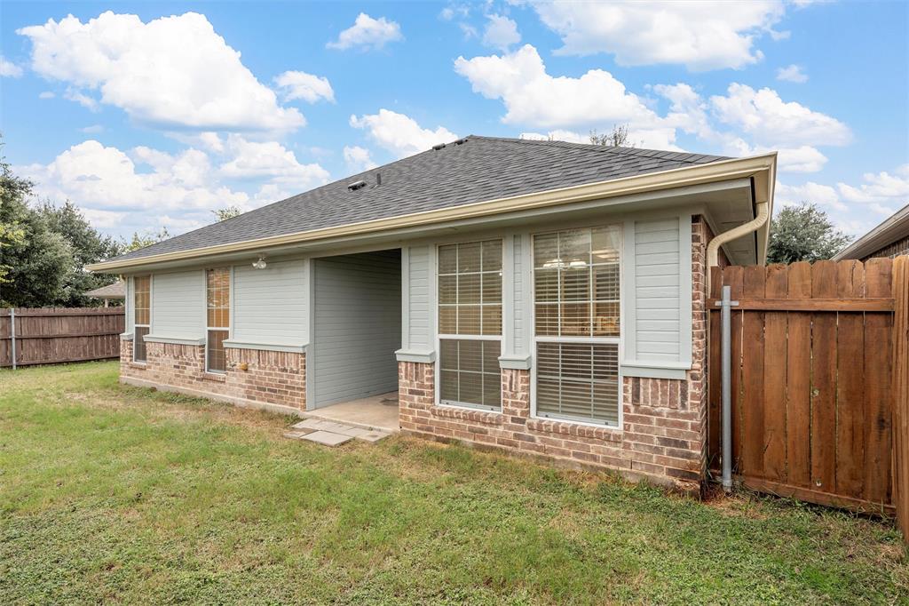 10121 Colony Drive Waco, TX 76708 - Photo 18 of 19 a house with yard in front of it