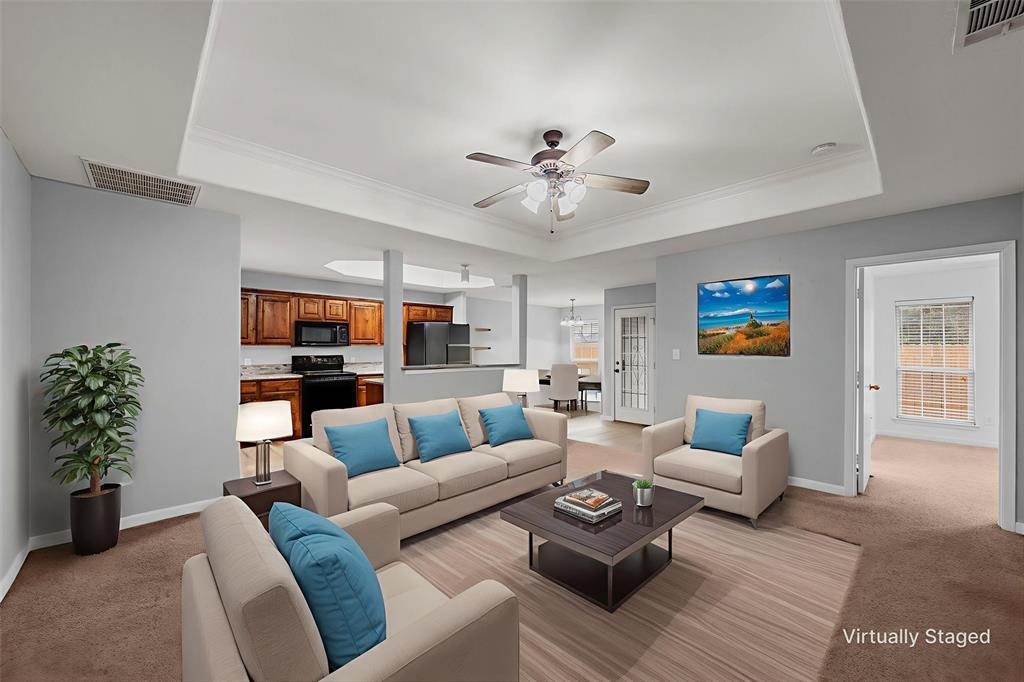 10121 Colony Drive Waco, TX 76708 - Photo 5 of 19 a living room with furniture or couch and a potted plant