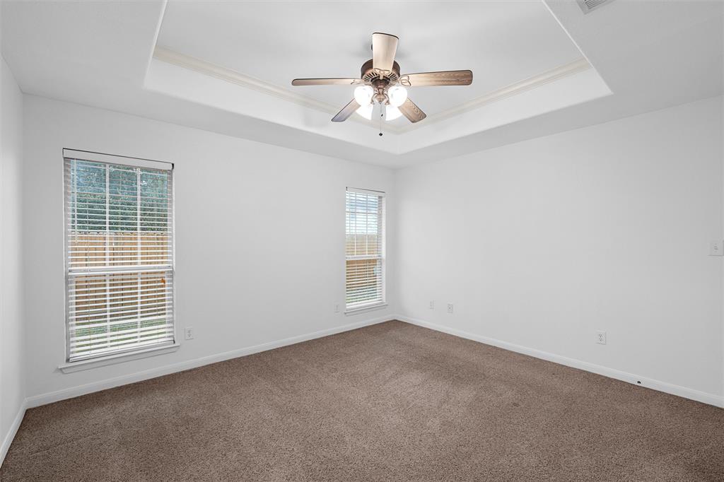10121 Colony Drive Waco, TX 76708 - Photo 9 of 19 a view of an empty room with a window