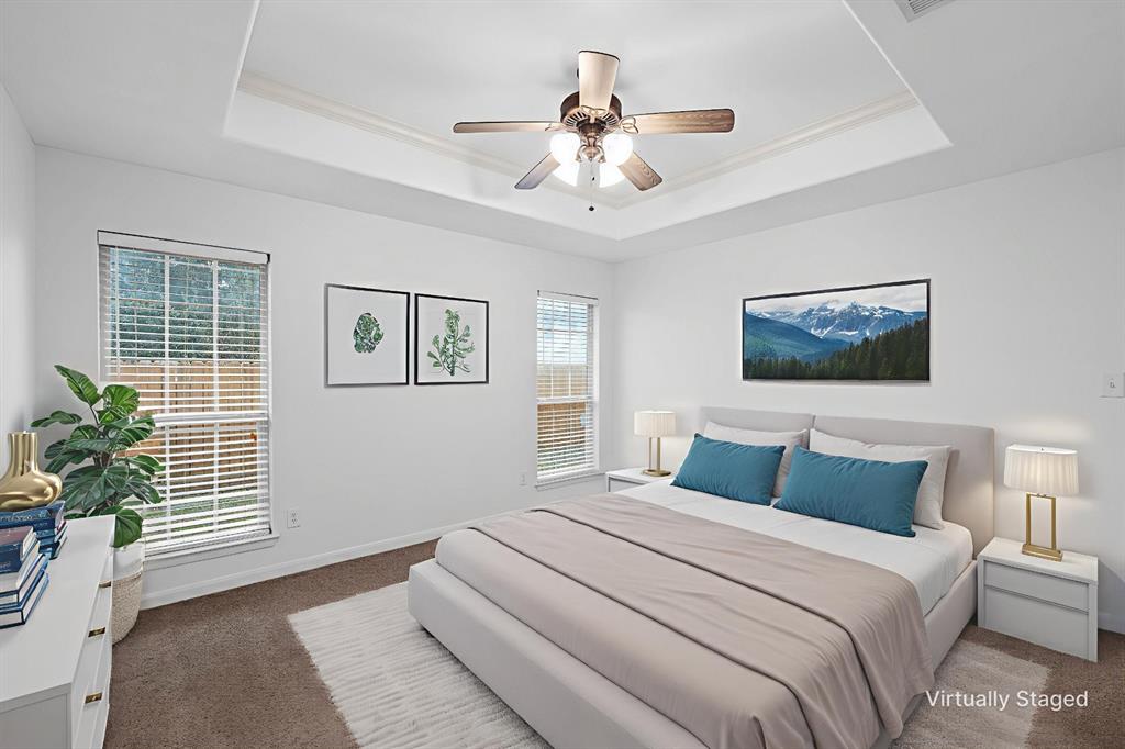 10121 Colony Drive Waco, TX 76708 - Photo 10 of 19 a bedroom with a large bed and a window