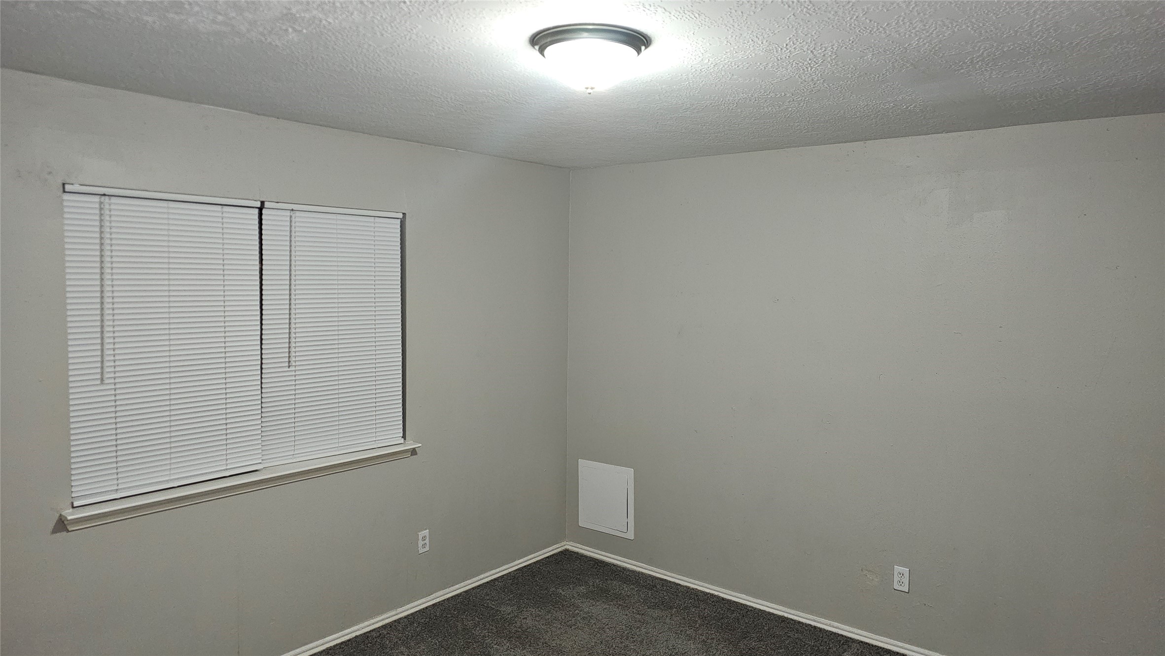 3602 Red Fir Drive Houston, TX 77088 - Photo 11 of 21 an empty room with a window