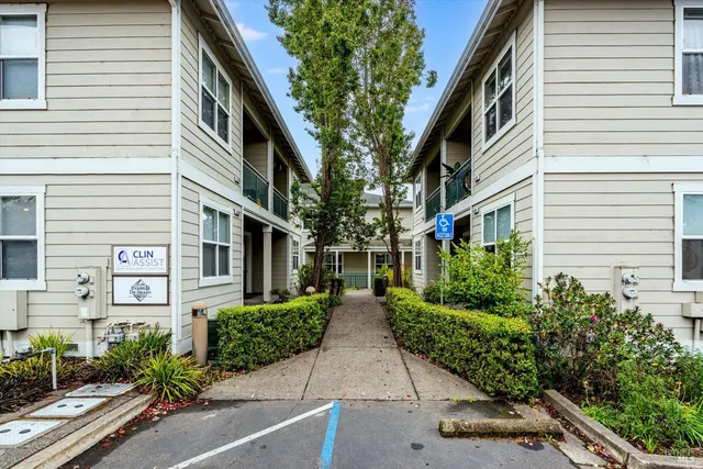 a view of a pathway with a house