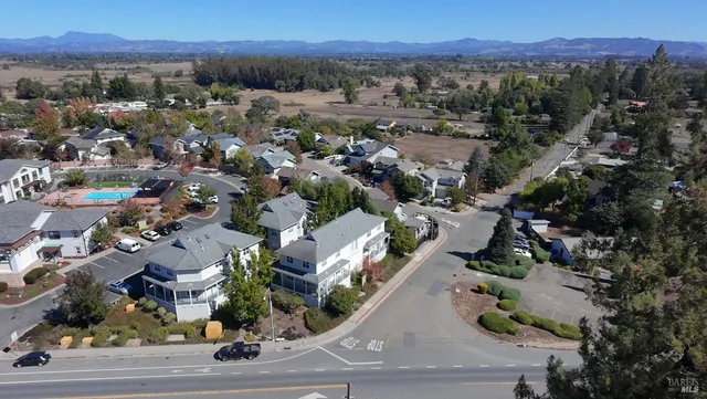 an aerial view of a city with lots of residential buildings
