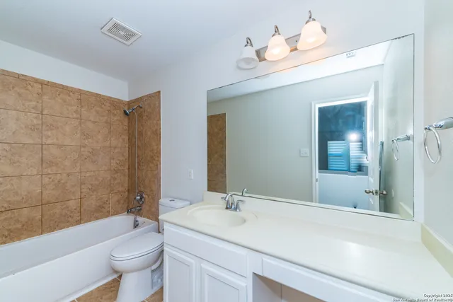 a view of a big room with carpet