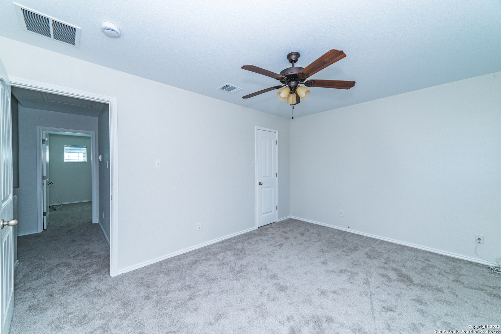7735 Brisbane Bend Converse, TX 78109 - Photo 14 of 15 a view of a big room with carpet
