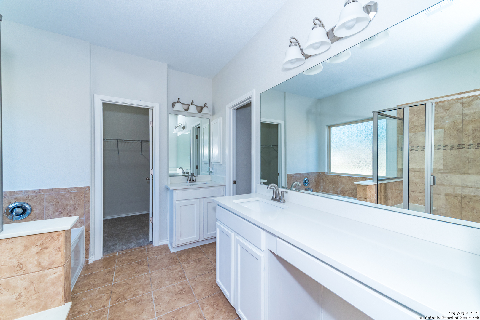 7735 Brisbane Bend Converse, TX 78109 - Photo 7 of 15 a bathroom with a sink and a mirror
