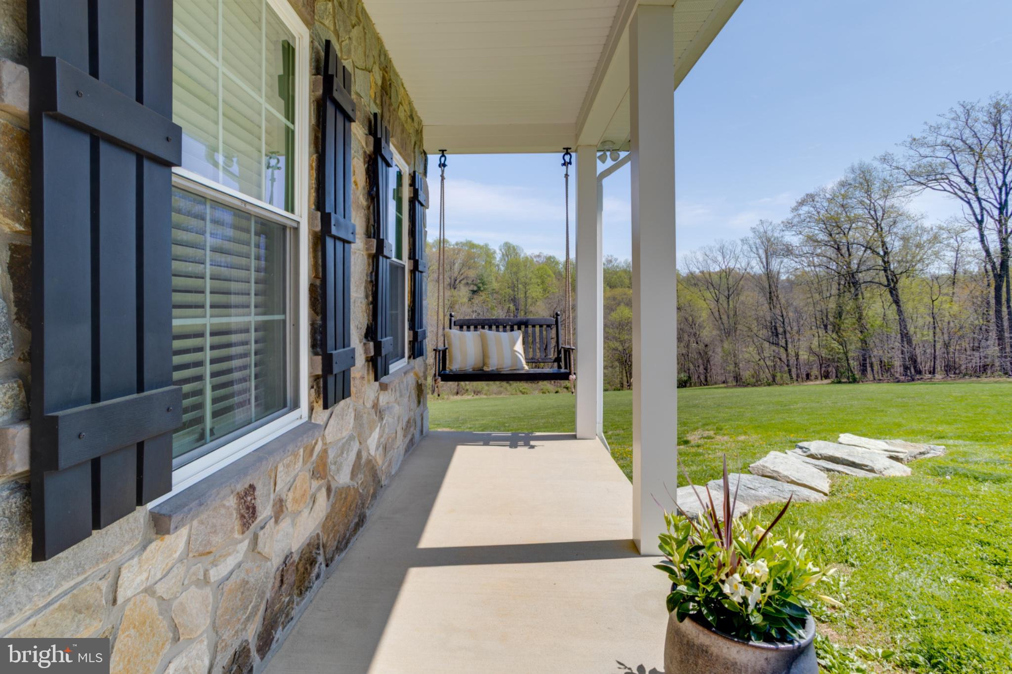 1296 Macton Road Street, MD 21154 - Photo 9 of 108 Charming stone porch with scenic views.