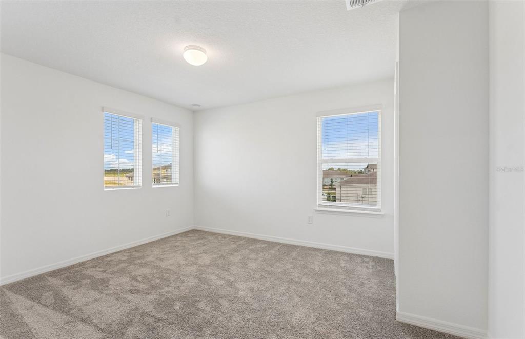 1691 Ruby Ln Lake Lake Alfred, FL 33850 - Photo 17 of 34 an empty room with a window