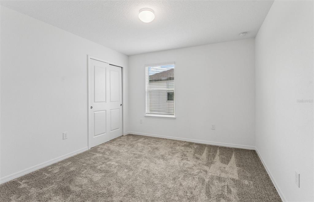 1691 Ruby Ln Lake Lake Alfred, FL 33850 - Photo 21 of 34 wooden floor in an empty room