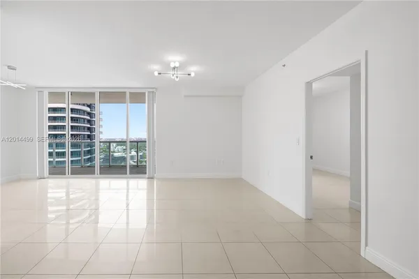 en empty room with windows