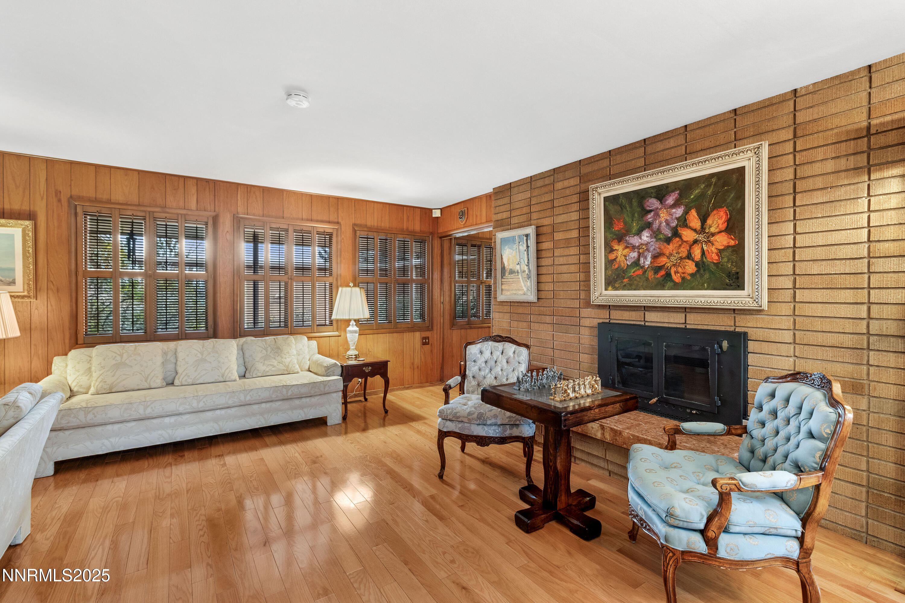 1885 Solari Drive Reno, NV 89509 - Photo 16 of 52 a living room with furniture and a fireplace